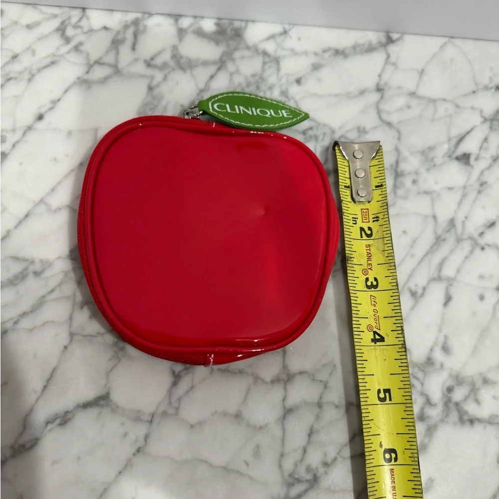Benefit and Clinique Vintage makeup pouches